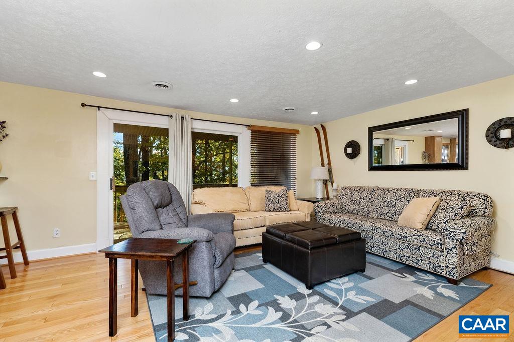411 Three Ridges Roseland, VA 22967 - Photo 6 of 27 a living room with furniture and a large window