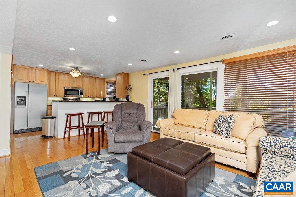 411 Three Ridges Roseland, VA 22967 - Photo 8 of 27 a living room with furniture and a table
