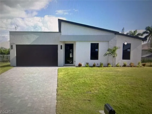 a front view of house with yard