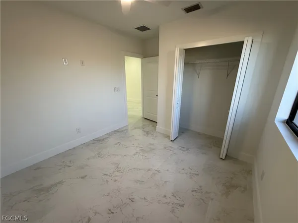 an empty room with window