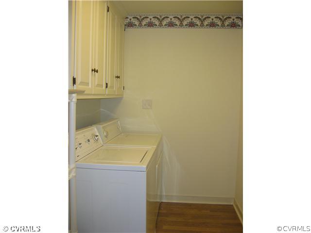 10830 Cherokee Road Midlothian, VA 23113 - Photo 12 of 17 a bathroom with a sink and a mirror