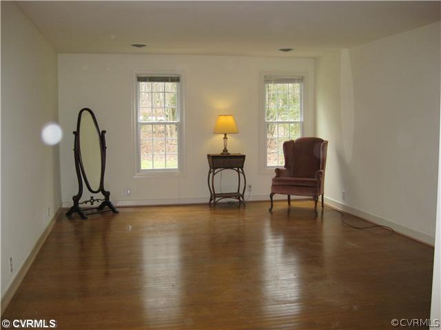 10830 Cherokee Road Midlothian, VA 23113 - Photo 14 of 17 a view of a workspace with furniture and a window
