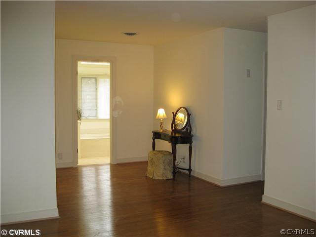 10830 Cherokee Road Midlothian, VA 23113 - Photo 15 of 17 a view of a livingroom with wooden floor
