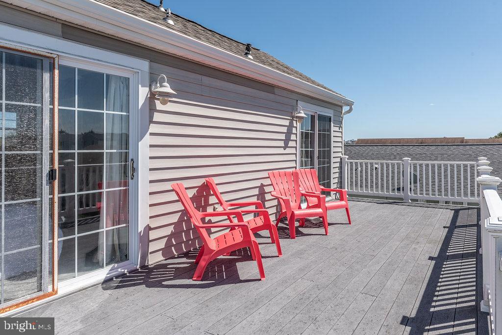13903 Sailing Road Ocean City, MD 21842 - Photo 51 of 70 Upper Deck with Entry to Both 2nd Floor Bedrooms