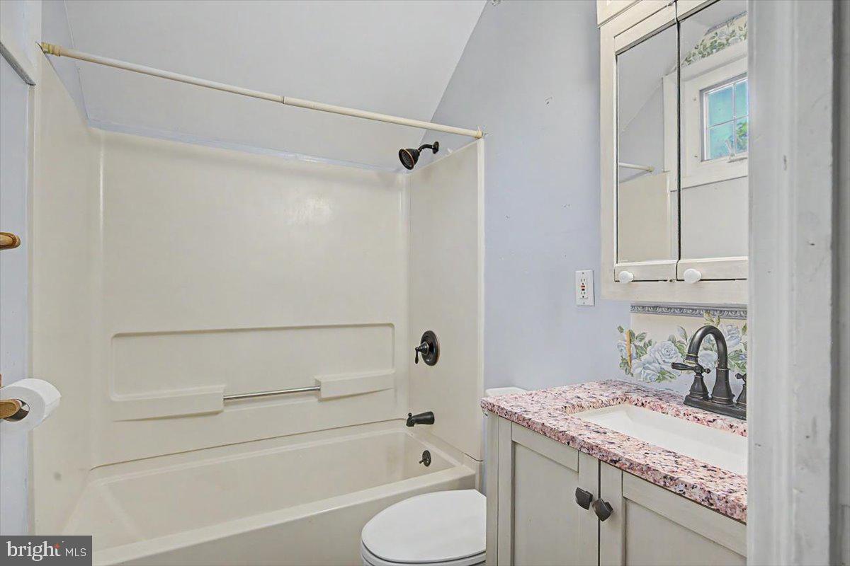 1010 Red Lion Road New Castle, DE 19720 - Photo 39 of 45 a bathroom with a granite countertop sink toilet and shower