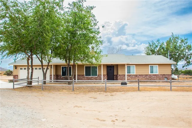 front view of a house with a patio