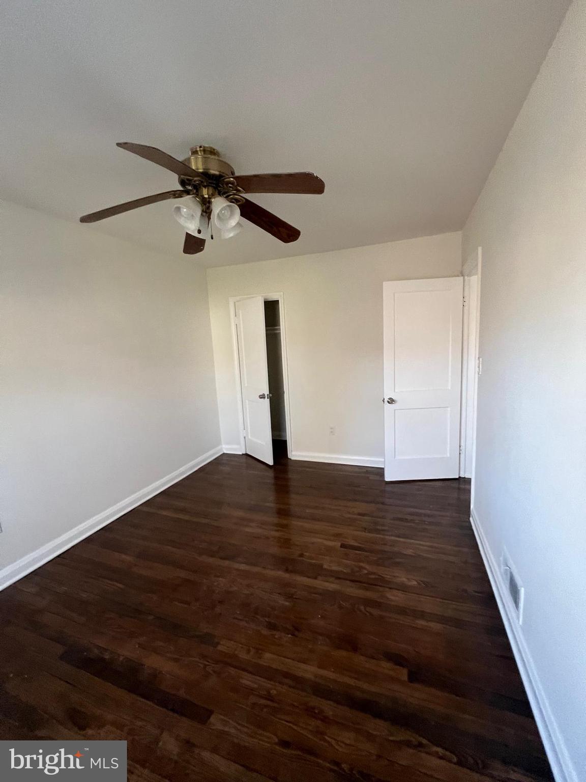 603 Braeside Road Baltimore, MD 21229 - Photo 24 of 30 a view of empty room with wooden floor