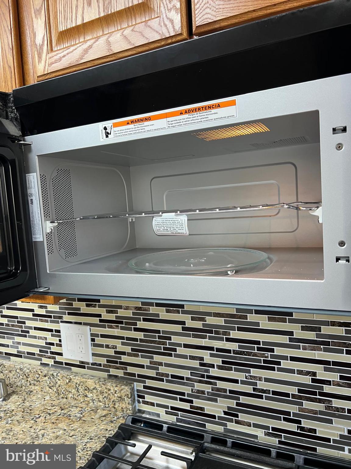 603 Braeside Road Baltimore, MD 21229 - Photo 7 of 30 a close view of kitchen countertops with stove