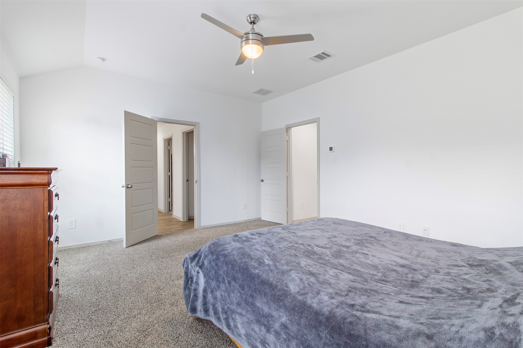 6685 Riplee Street Beaumont, TX 77713 - Photo 16 of 29 Ceiling fan in Primary Bedroom