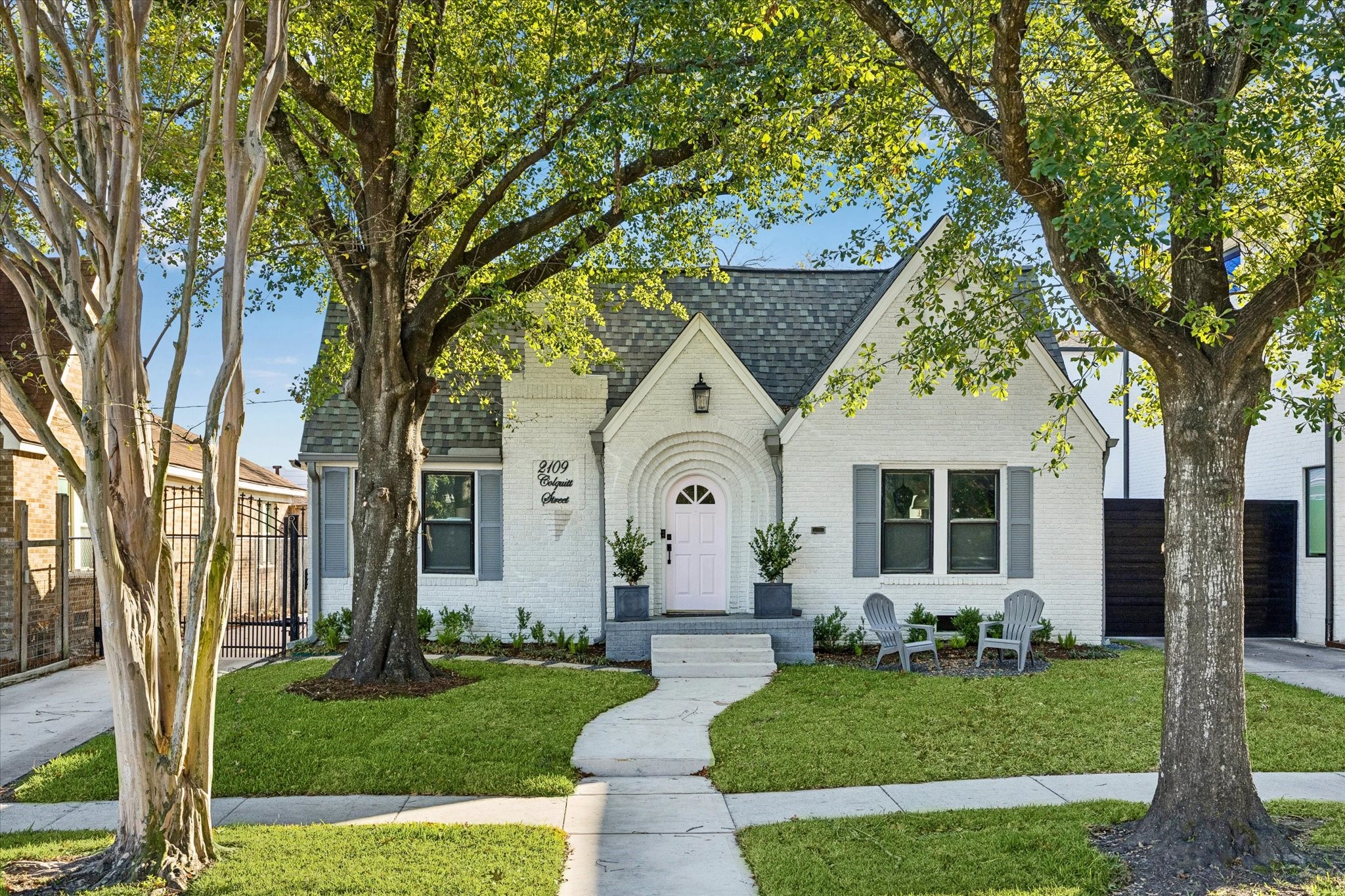 2109 Colquitt Street Houston, TX 77098 - Photo 1 of 28 Charming curb appeal defines this beautifully updated brick cottage, framed by mature trees, manicured landscaping, and a welcoming front lawn.