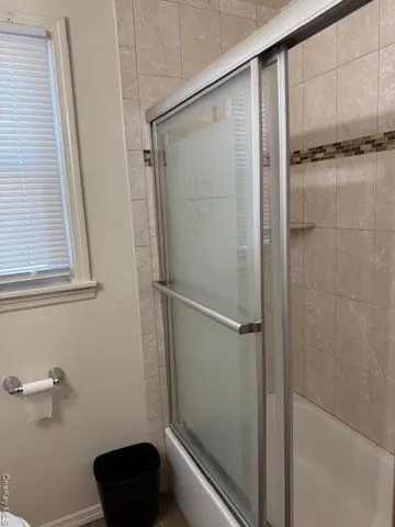 a kitchen with a stove and a refrigerator