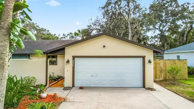 a front view of a house with a garage