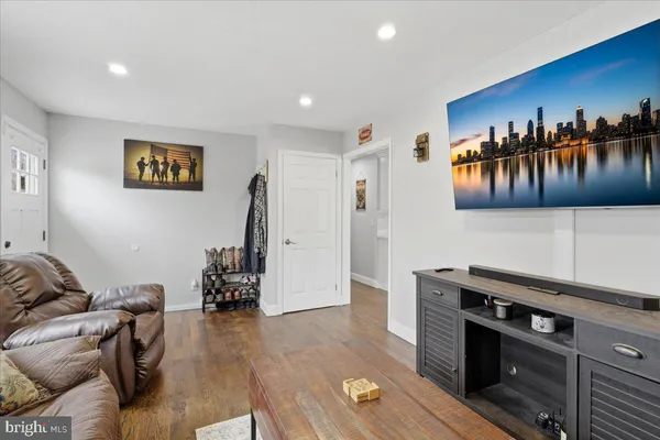 a view of a livingroom with furniture and furniture