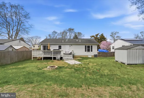 a front view of house with yard and seating area