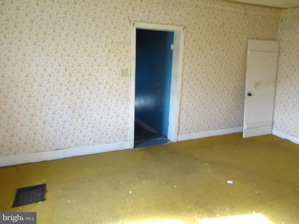 a view of an empty room with window