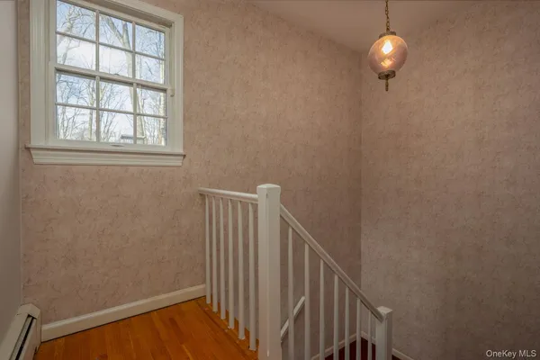 a view of a hallway with window