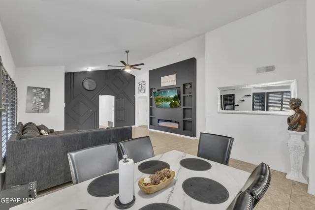 a kitchen with a sink stove and refrigerator