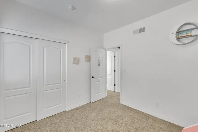 a view of a workspace with furniture