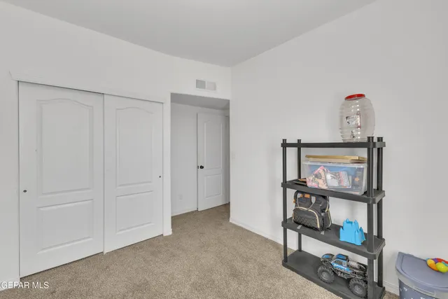 a bathroom with a shower and a sink