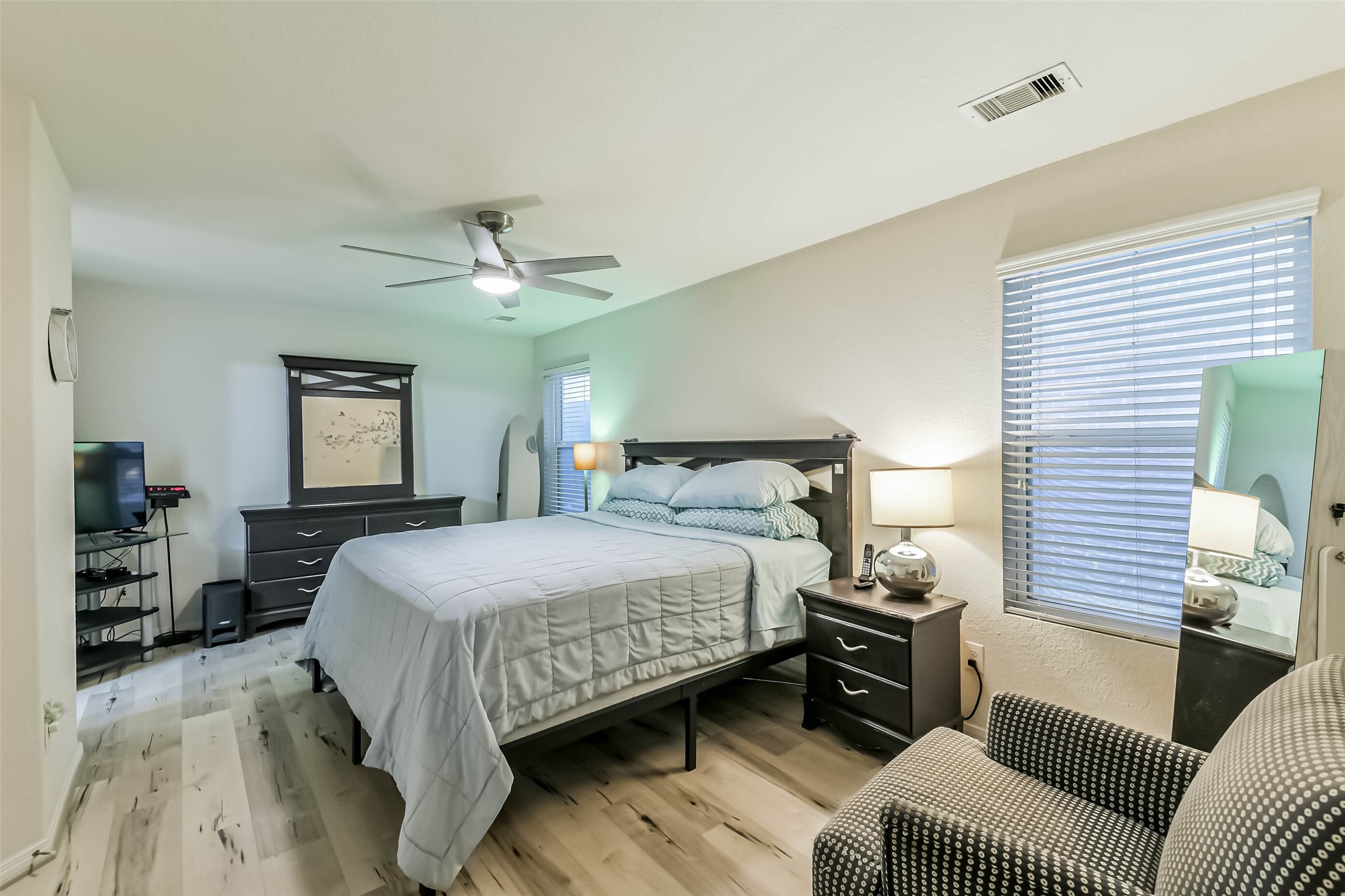 2504 Elm Crossing Trail Spring, TX 77386 - Photo 24 of 40 a bedroom with a bed and a couch