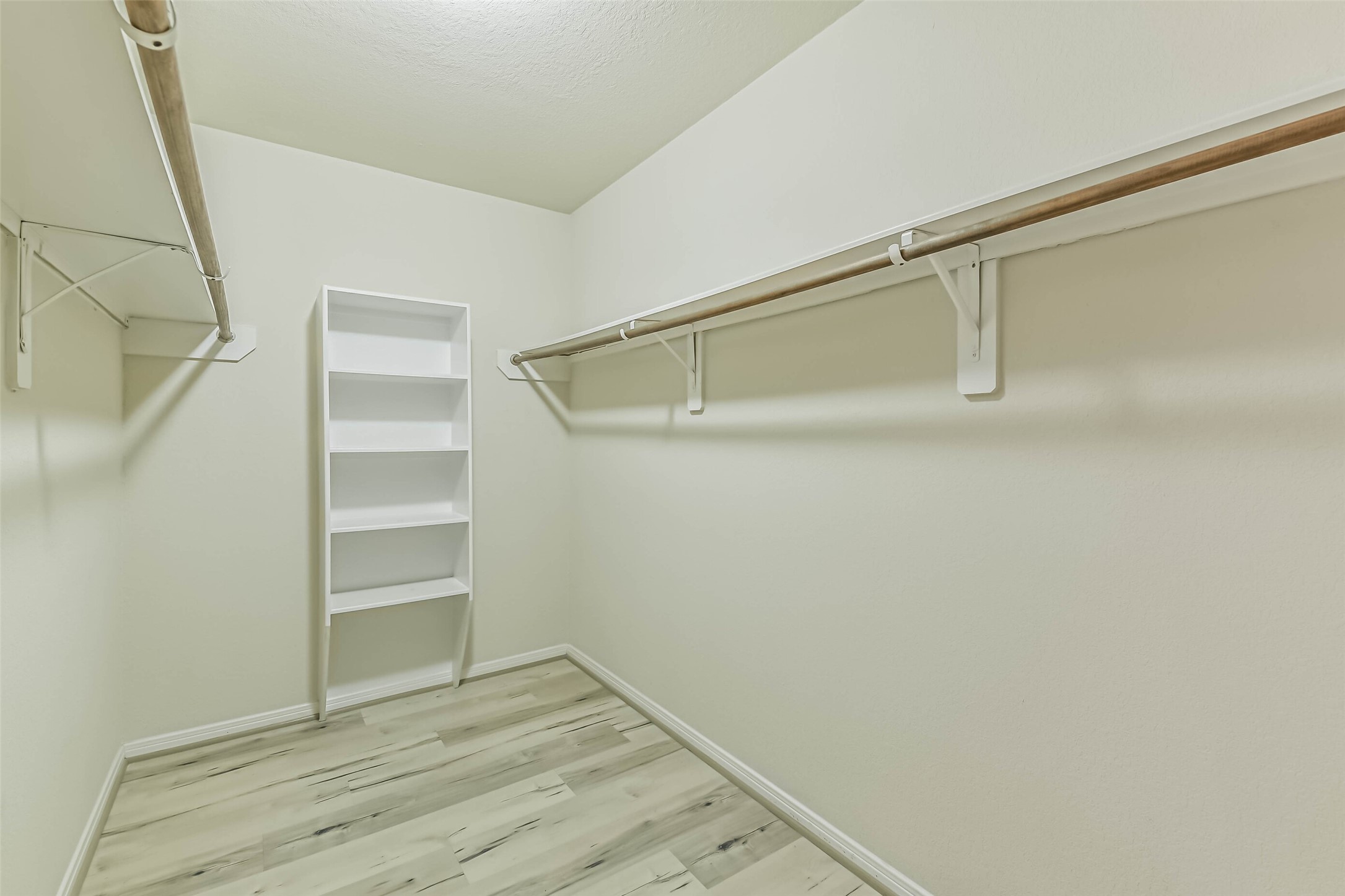 2504 Elm Crossing Trail Spring, TX 77386 - Photo 25 of 40 a view of an empty walk in closet