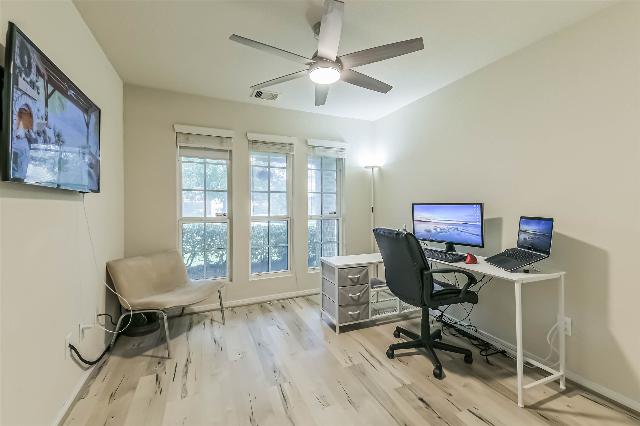 2504 Elm Crossing Trail Spring, TX 77386 - Photo 28 of 40 a view of a workspace with furniture and a window