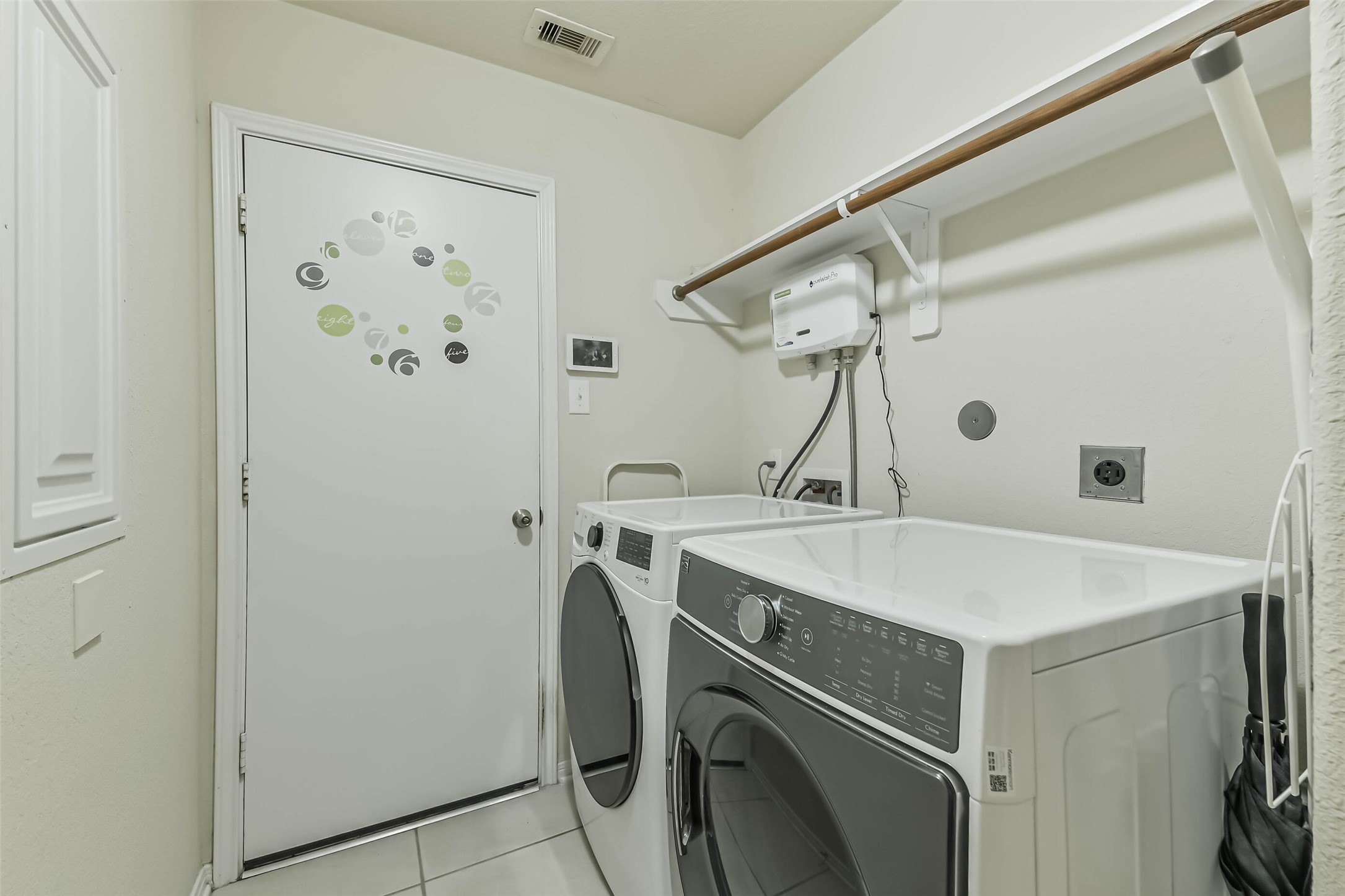 2504 Elm Crossing Trail Spring, TX 77386 - Photo 30 of 40 a utility room with dryer and washer