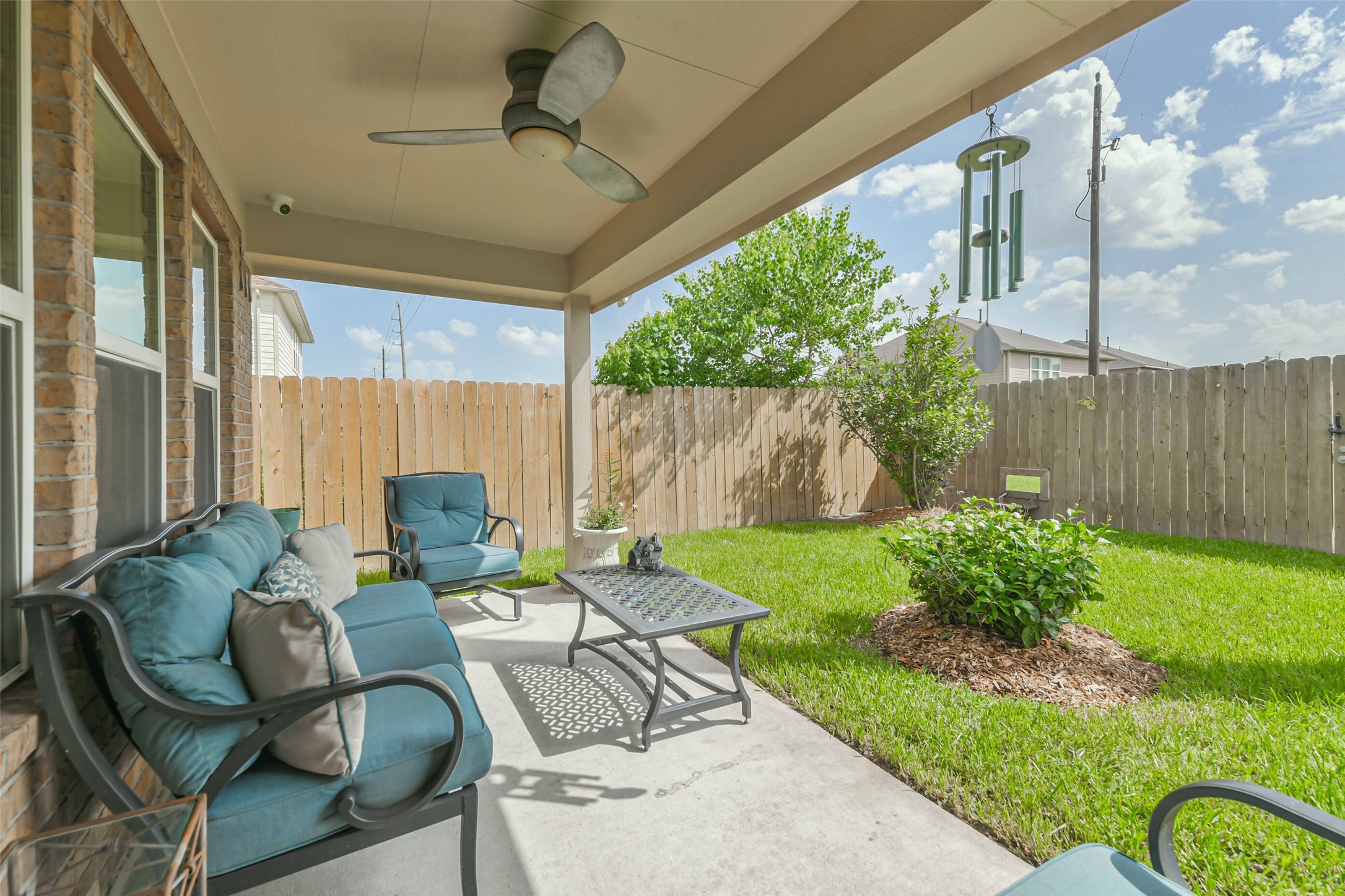 2504 Elm Crossing Trail Spring, TX 77386 - Photo 34 of 40 a view of an outdoor sitting area with furniture and garden