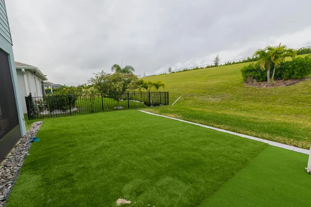 a view of a field with grass
