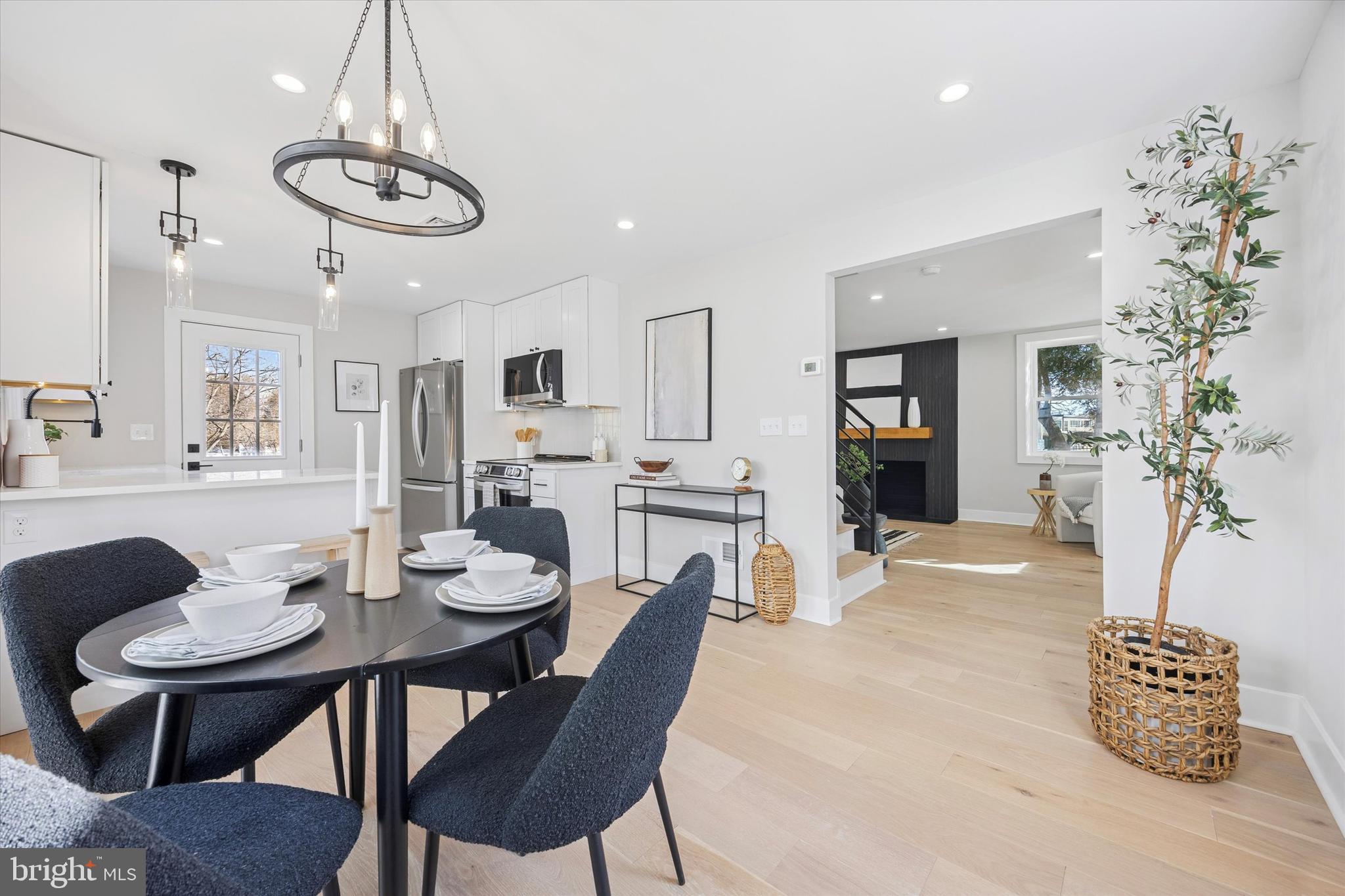 219 Williamsburg Road Ardmore, PA 19003 - Photo 16 of 75 a view of a dining room with furniture wooden floor and chandelier
