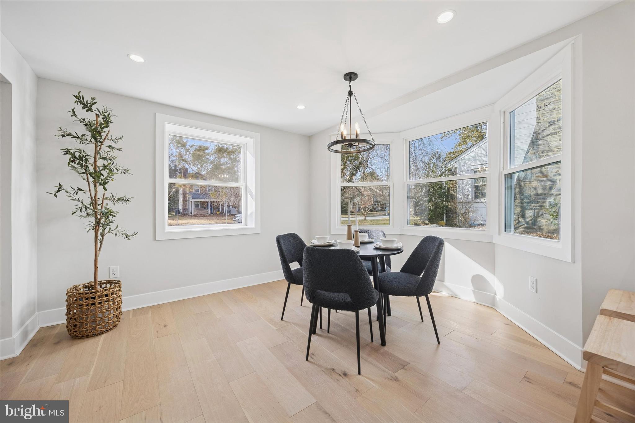 219 Williamsburg Road Ardmore, PA 19003 - Photo 17 of 75 a view of a dining room with furniture window and outside view