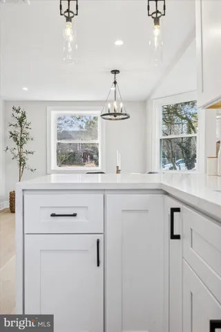 a bedroom with a bed and a mirror