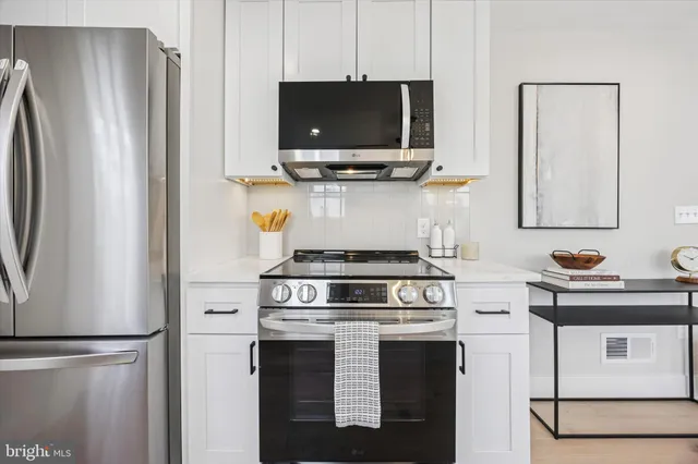 a bathroom with a toilet a sink and a bathtub