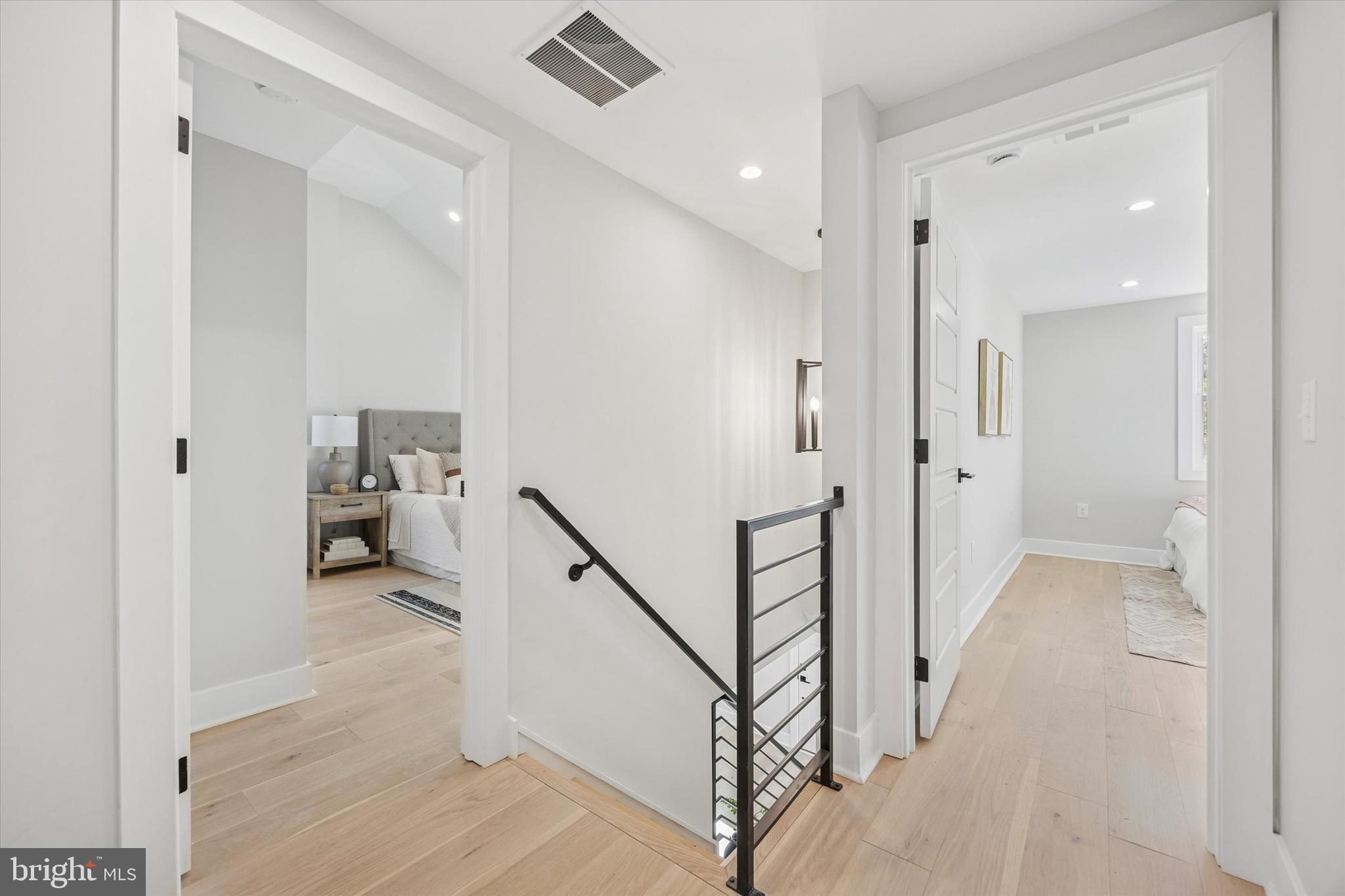 219 Williamsburg Road Ardmore, PA 19003 - Photo 26 of 75 a view of a hallway with a livingroom and stairs