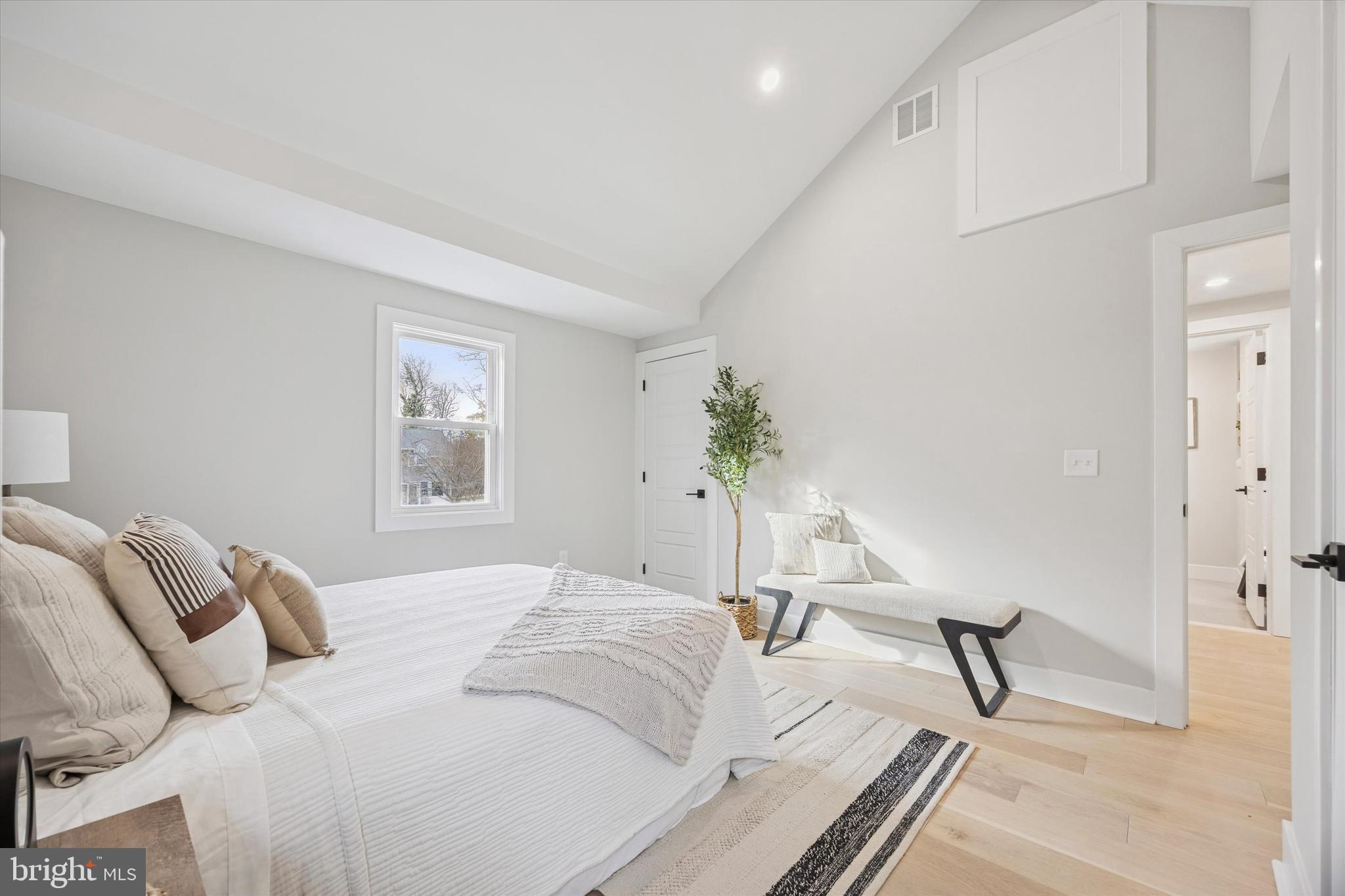 219 Williamsburg Road Ardmore, PA 19003 - Photo 28 of 75 a bedroom with a bed and a window