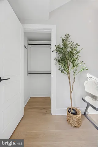 a bedroom with a bed and a rug