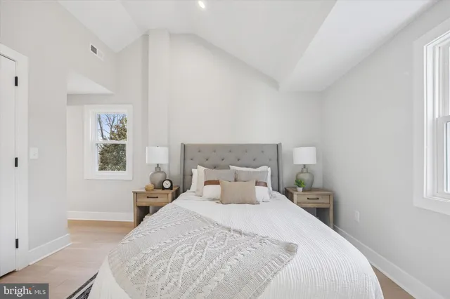 a bathroom with a bathtub and a sink