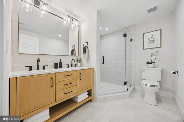 a bathroom with a tub and a shower