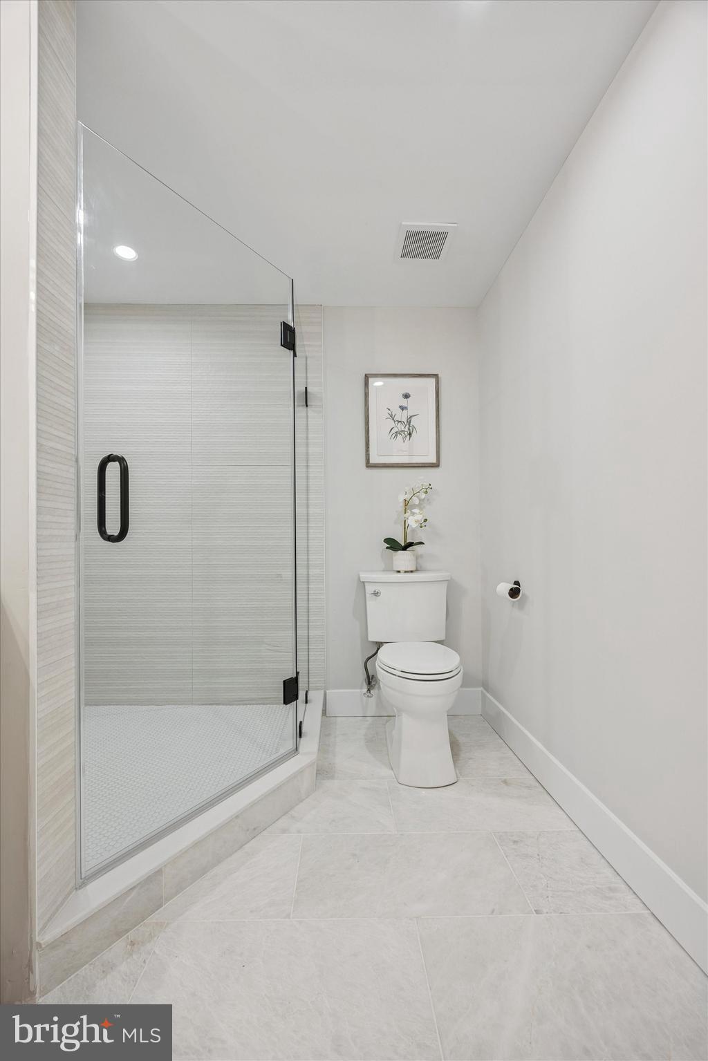 219 Williamsburg Road Ardmore, PA 19003 - Photo 37 of 75 a bathroom with a toilet and a shower