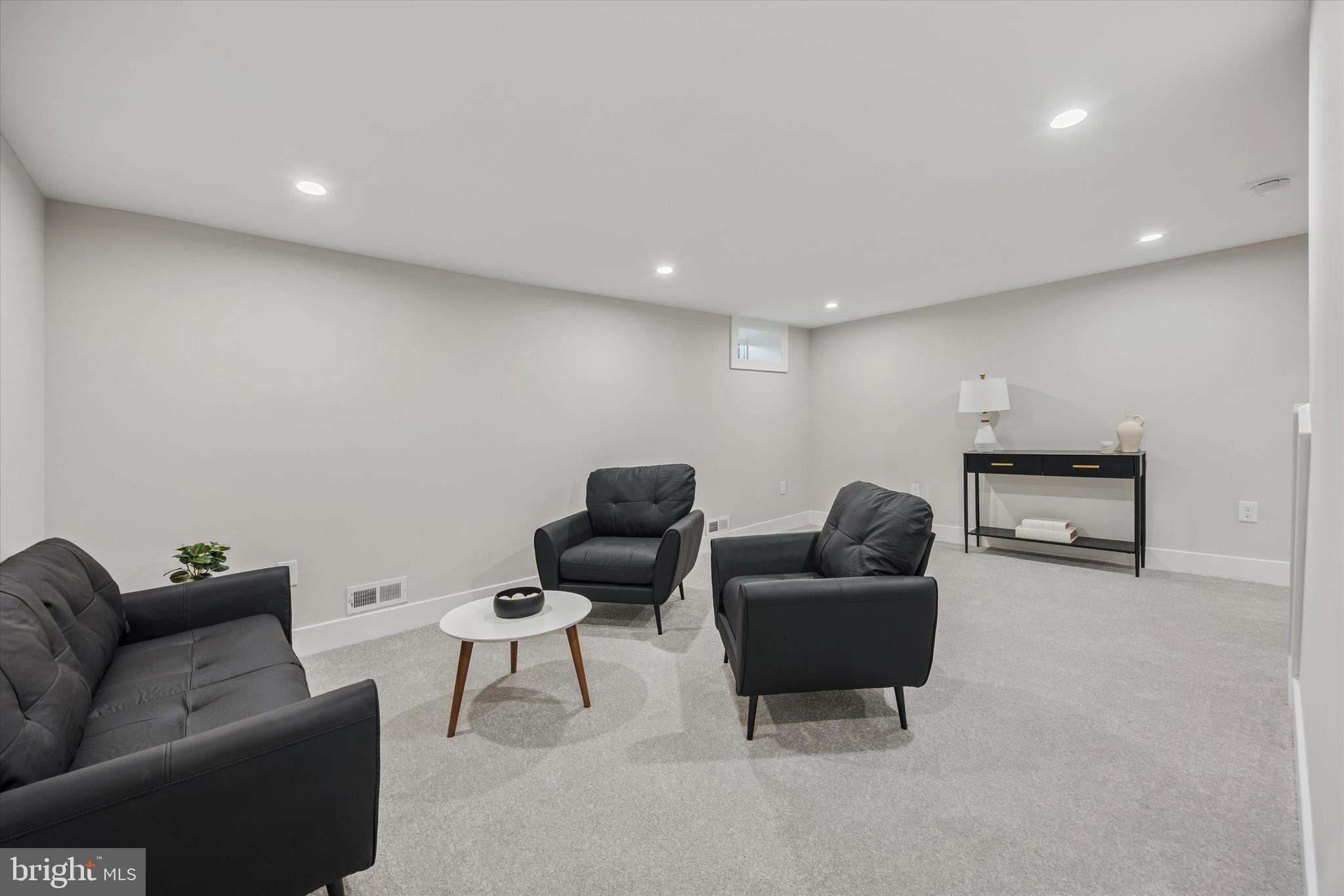 219 Williamsburg Road Ardmore, PA 19003 - Photo 61 of 75 a living room with furniture and a couch