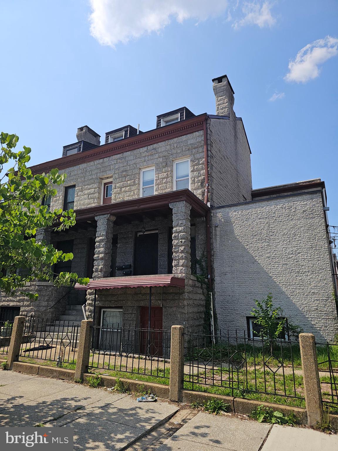 3514 Bank Street Baltimore, MD 21224 - Photo 2 of 71 a front view of a house with garage