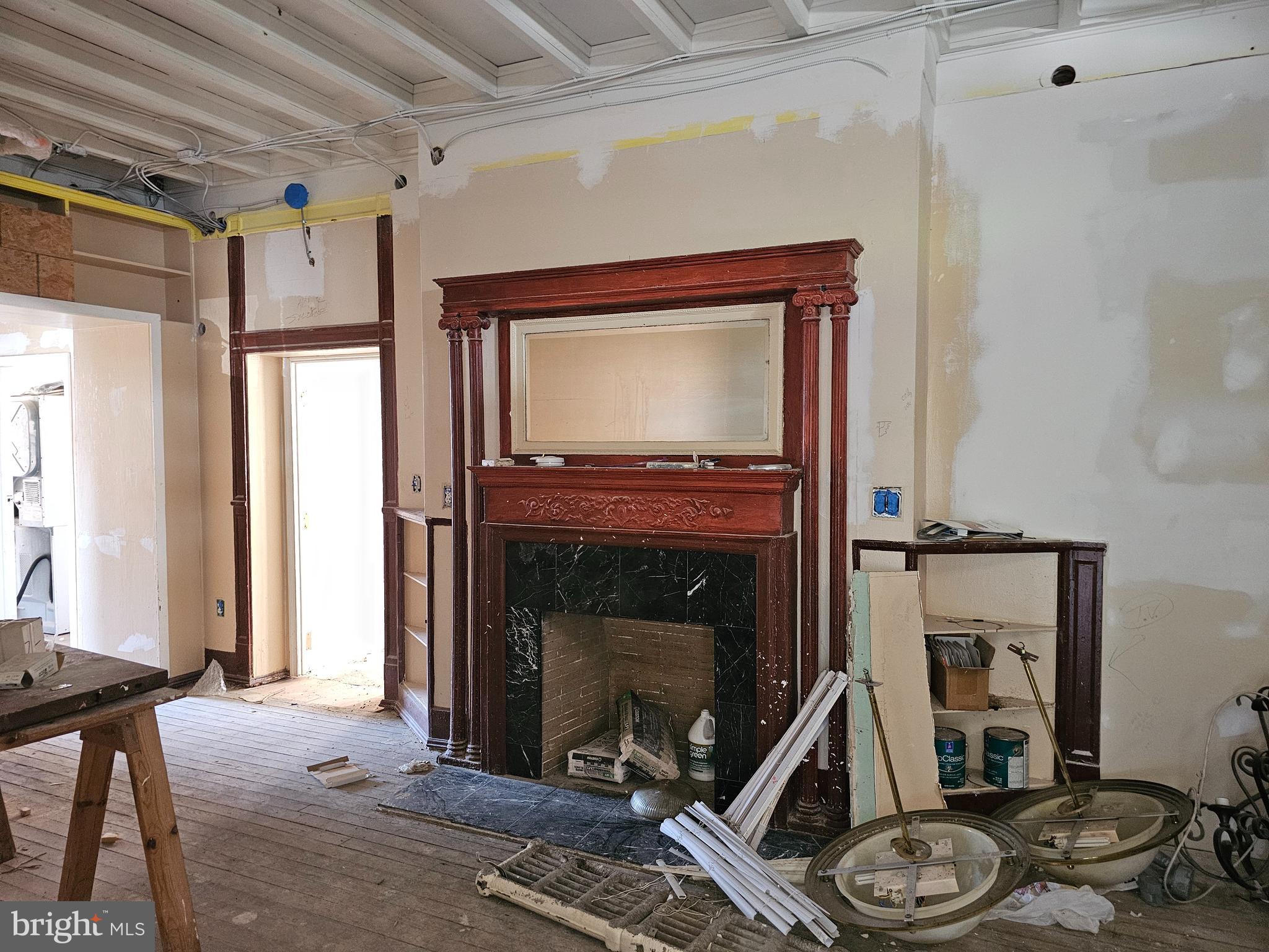 3514 Bank Street Baltimore, MD 21224 - Photo 24 of 71 a living room with furniture and a fireplace