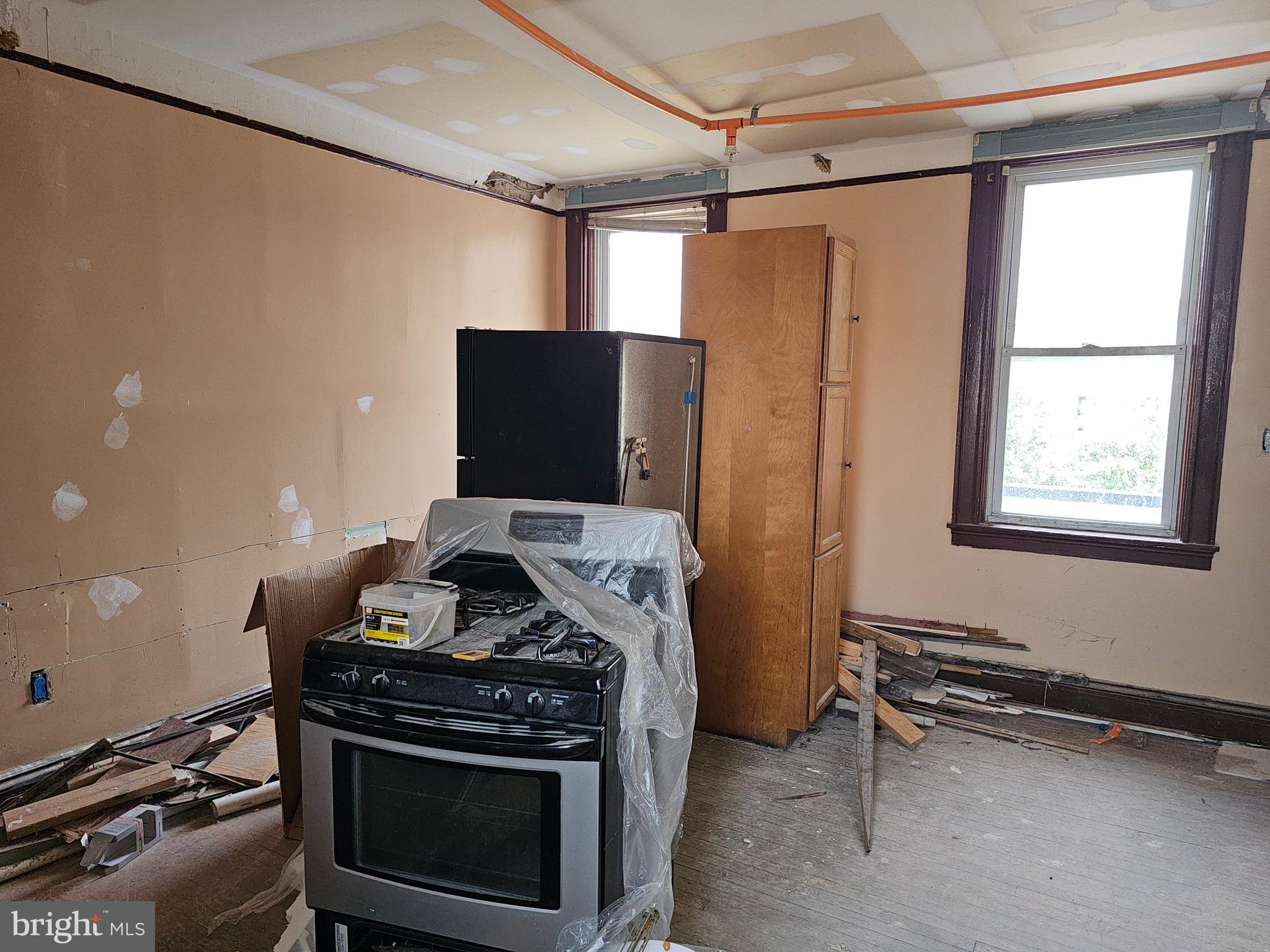 3514 Bank Street Baltimore, MD 21224 - Photo 37 of 71 a room with furniture and a fireplace