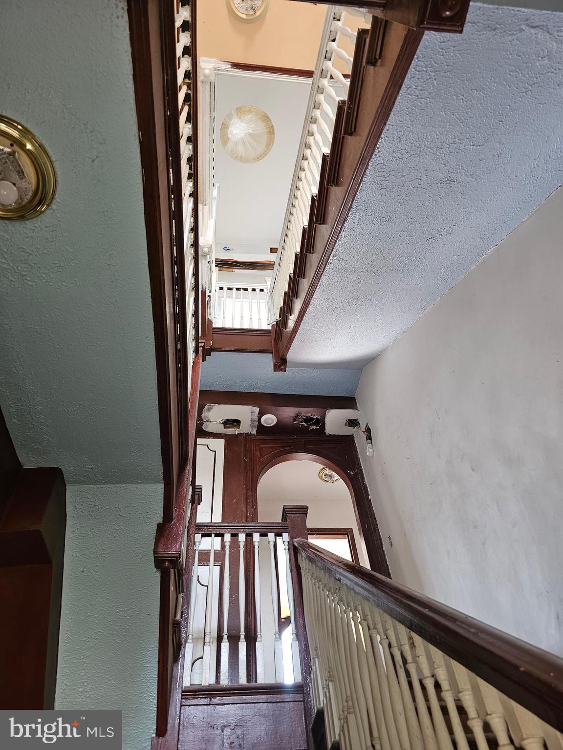 3514 Bank Street Baltimore, MD 21224 - Photo 55 of 71 a view of staircase with railing and white walls
