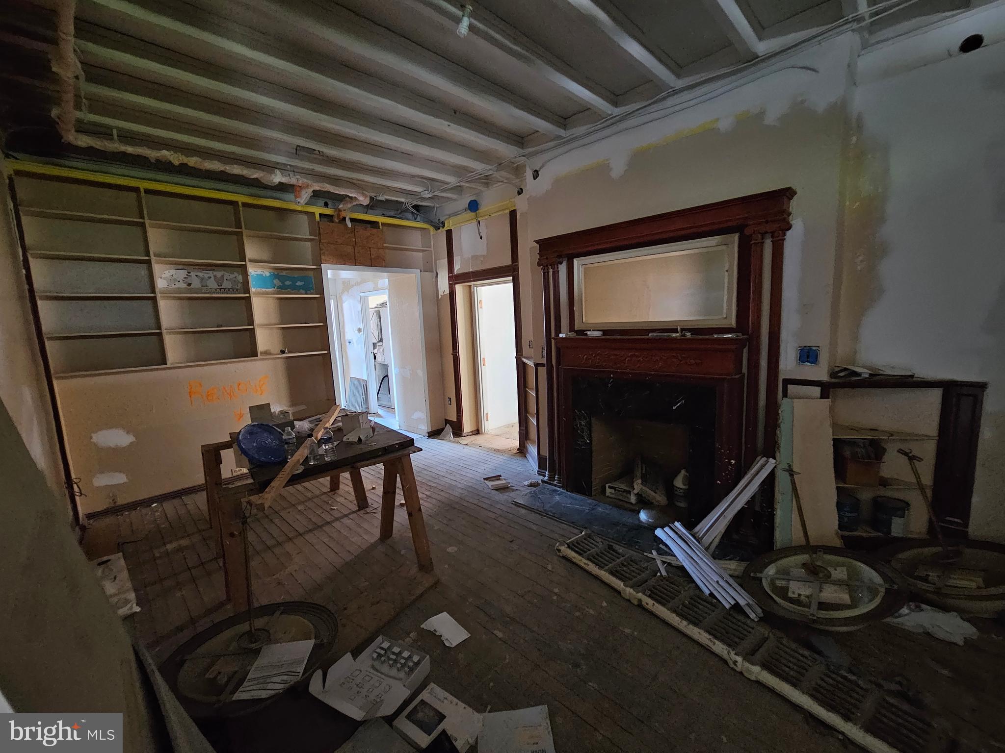 3514 Bank Street Baltimore, MD 21224 - Photo 58 of 71 a room with furniture and a fireplace