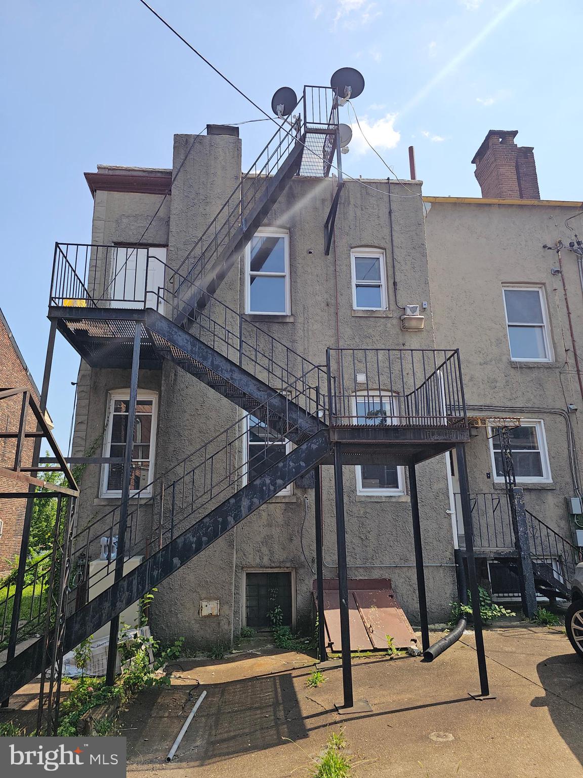 3514 Bank Street Baltimore, MD 21224 - Photo 7 of 71 a front view of a building with a yard