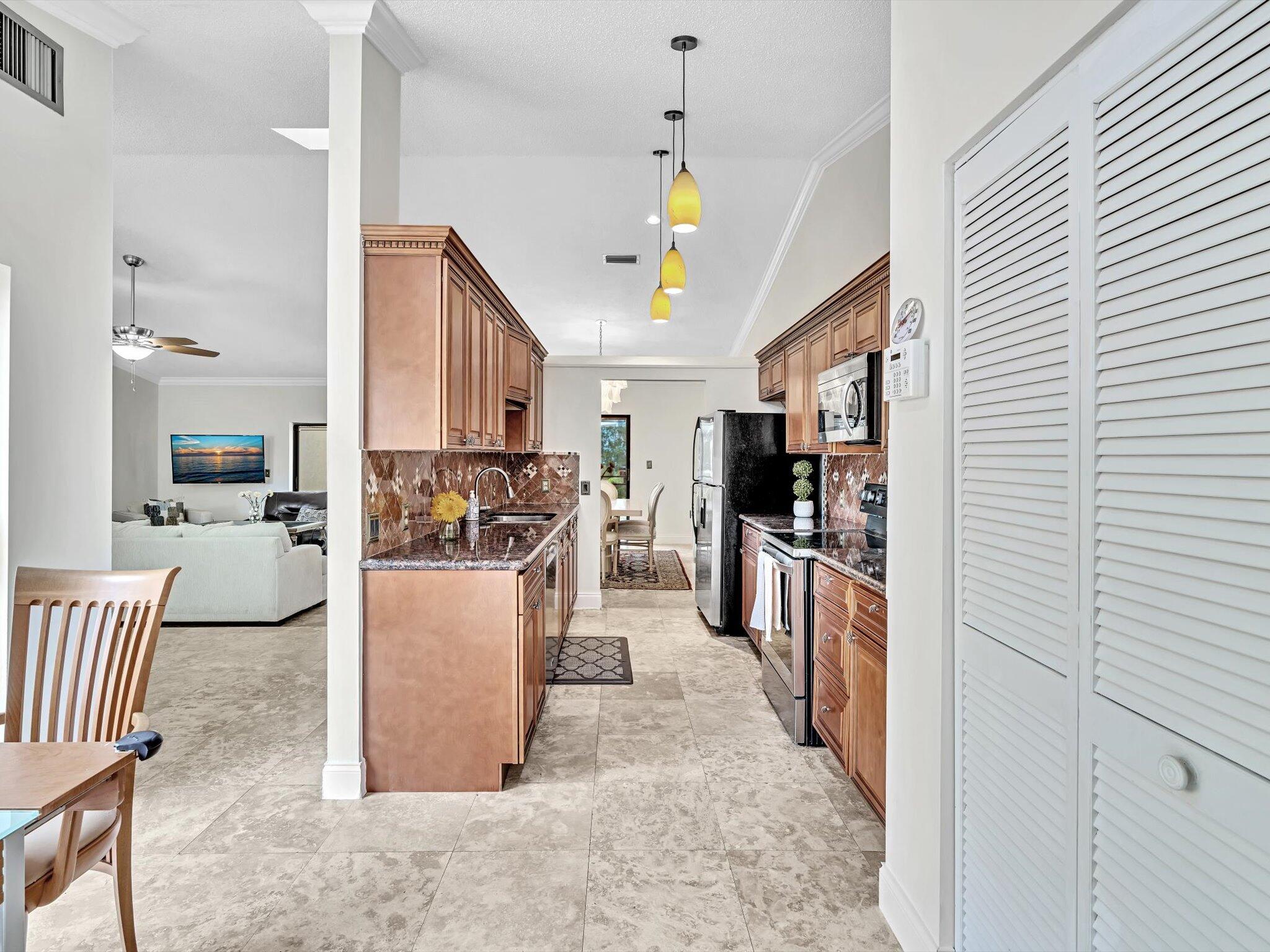 23253 Boca Club Colony Circle Boca Raton, FL 33433 - Photo 17 of 56 Pantry - Kitchen