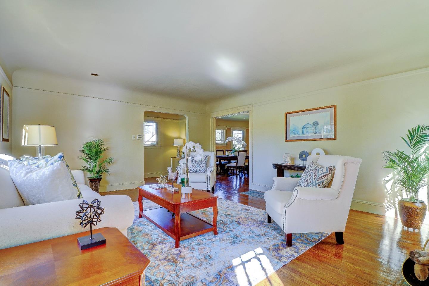2701 Hillside Drive Burlingame, CA 94010 - Photo 13 of 50 a living room with furniture and wooden floor
