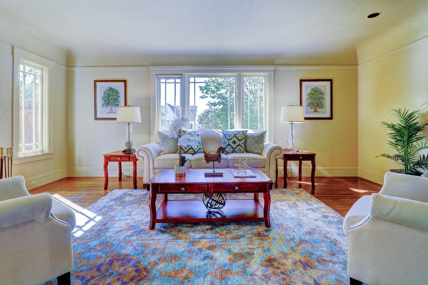 2701 Hillside Drive Burlingame, CA 94010 - Photo 14 of 50 a living room with furniture a rug and a large window