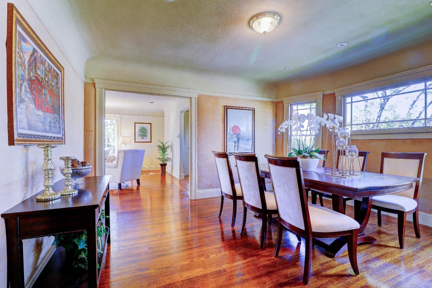 2701 Hillside Drive Burlingame, CA 94010 - Photo 16 of 50 a view of a dining room with furniture window and wooden floor
